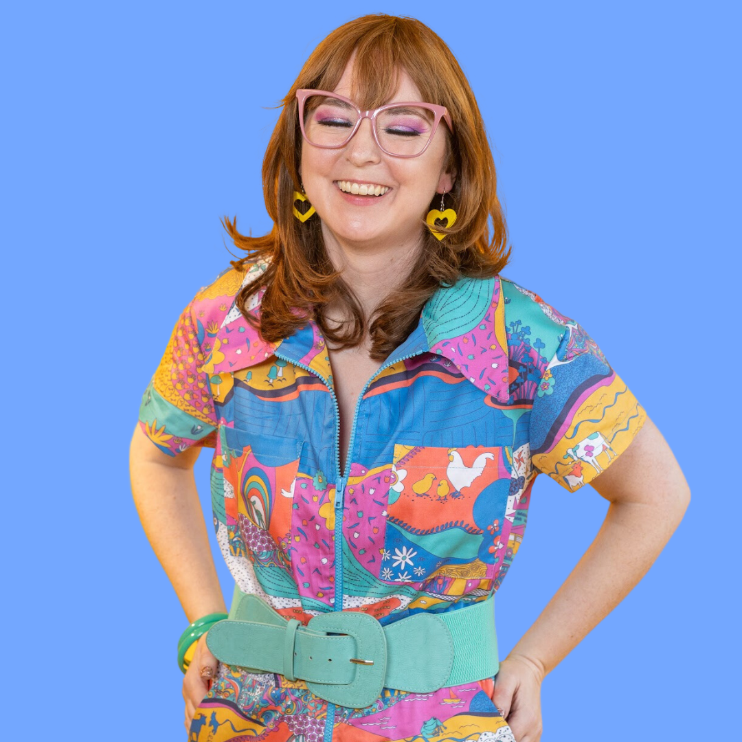 Closeup of pretty model in bright, colorful printed jumpsuit