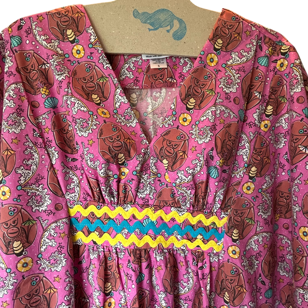 Pink monkey and pineapple print caftan with ricrac