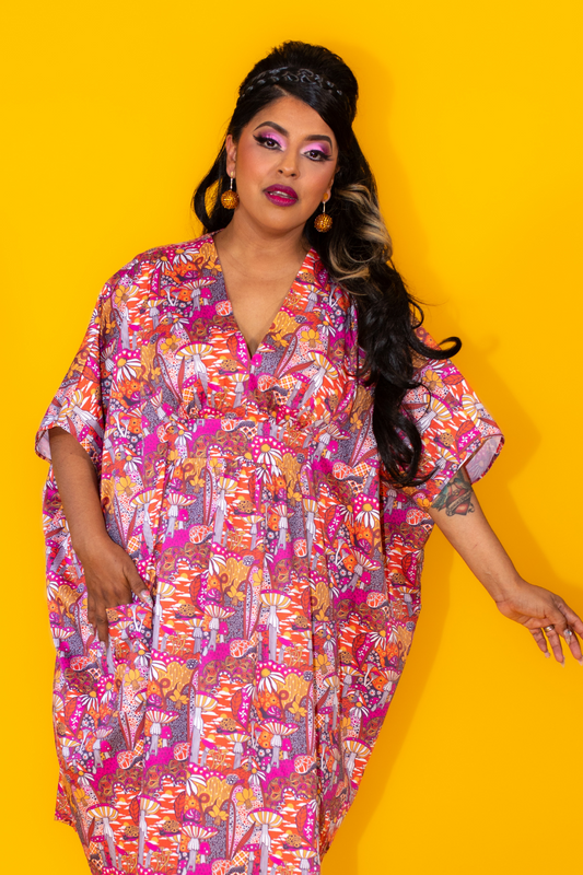Latina model in mushroom print long caftan