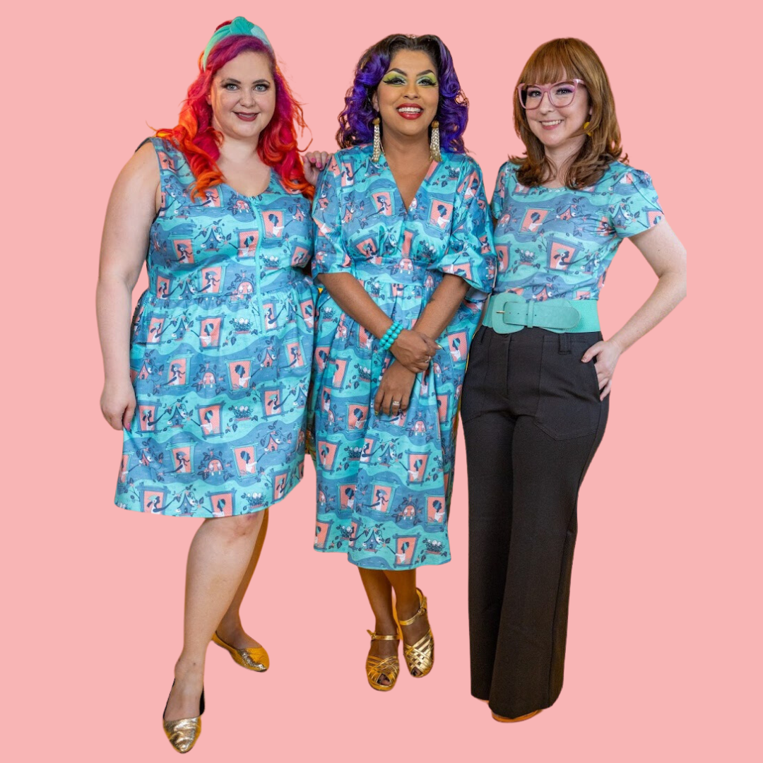 3 girls in matching peach, aqua and grey clothing featuring vintage girls feeding birds