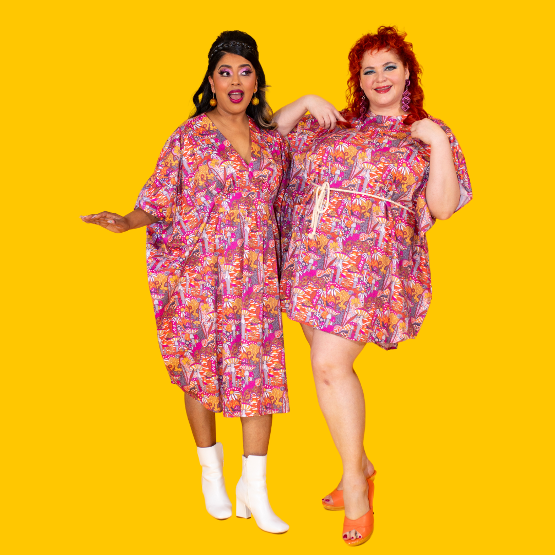 2 models in bright mushroom print clothing