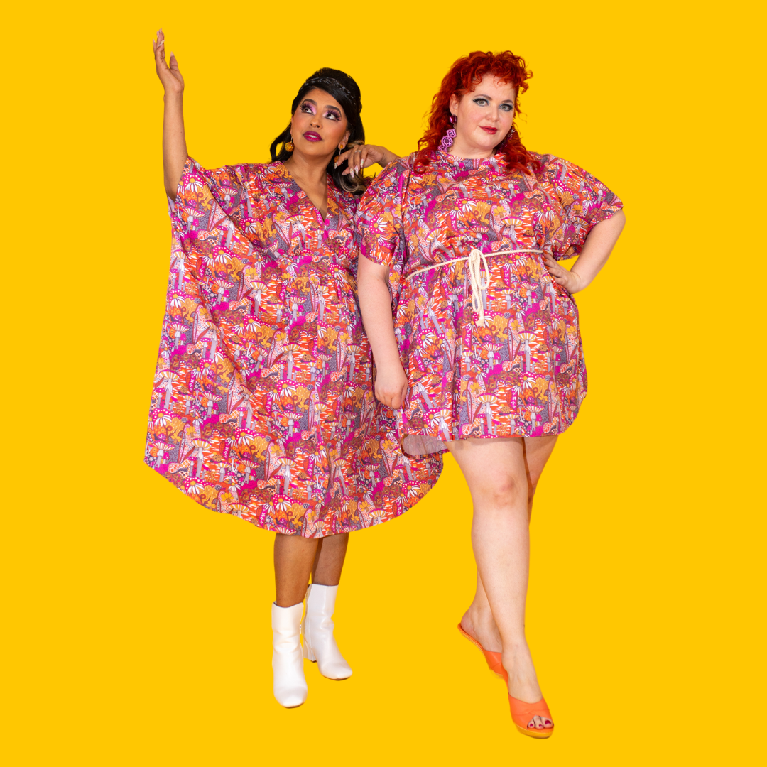 2 fun models in bright mushroom print clothing