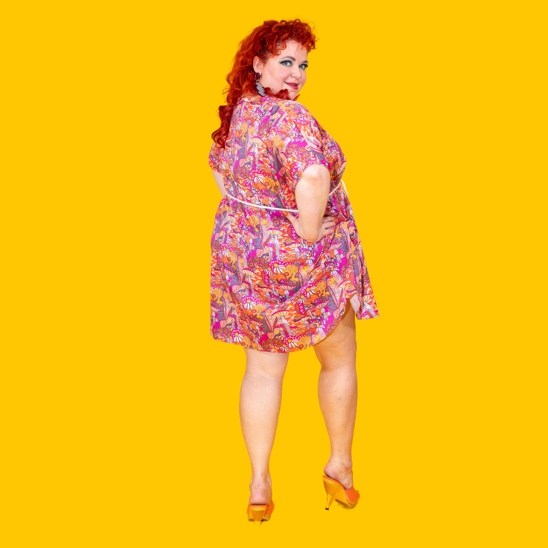 Back view of mini muumuu with rope belt