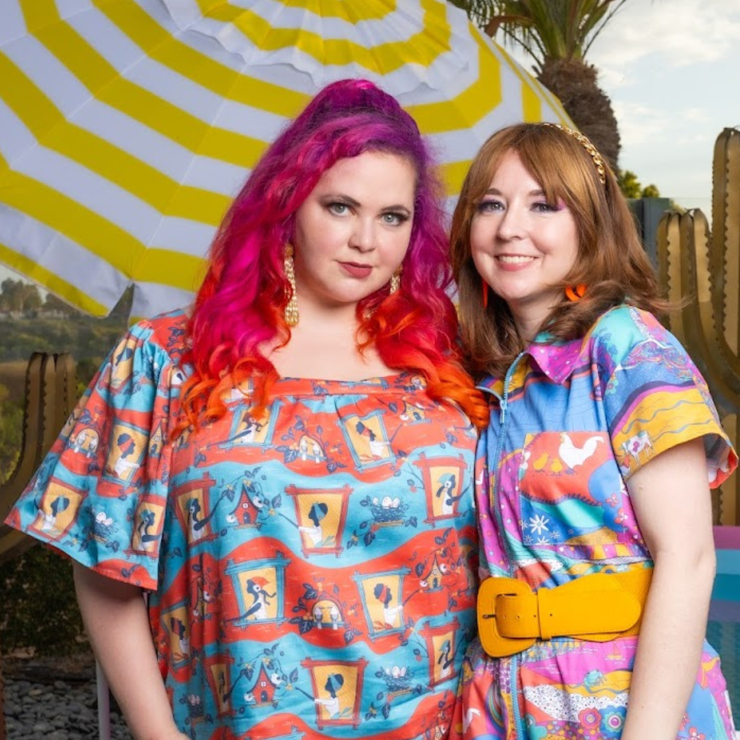 Two models wearing bright colored printed cotton clothing