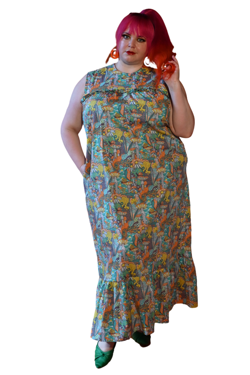 Pink-haired model in mushroom print maxi dress with bottom ruffle and pockets