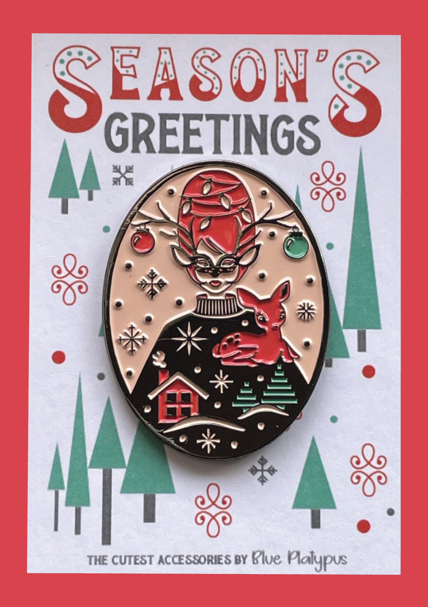 Bright vintage inspired red and green enamel pin of masked woman with beehive hair holding reindeer on cute card