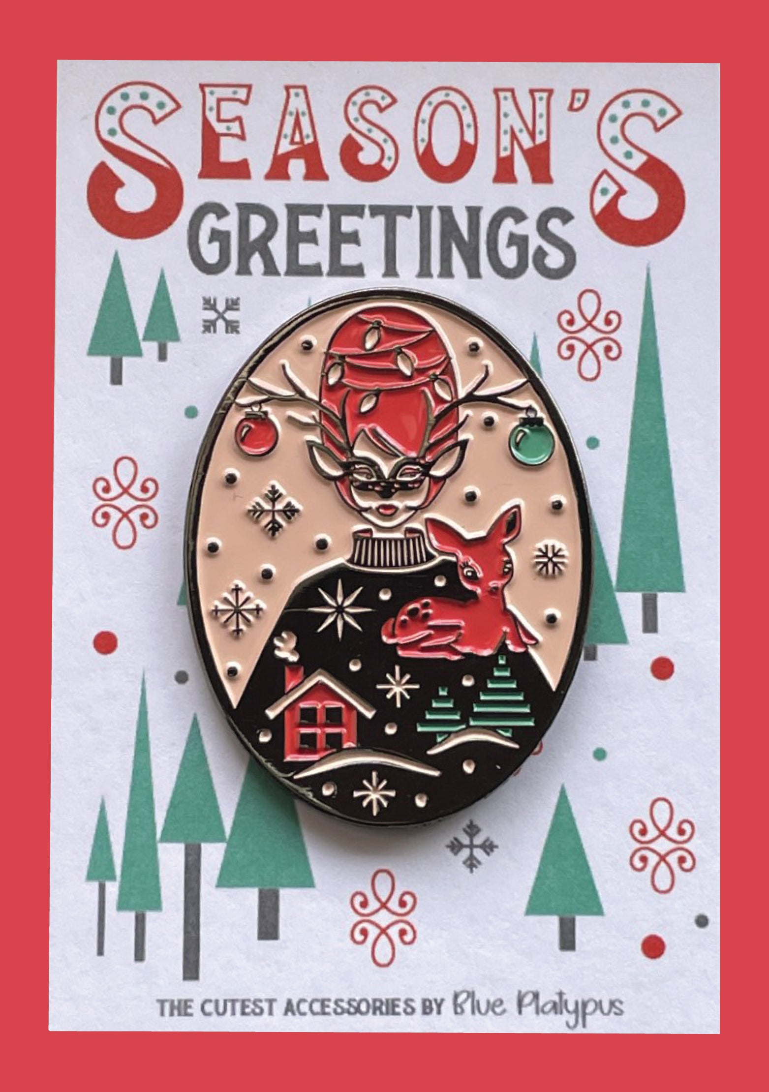 Bright vintage inspired red and green enamel pin of masked woman with beehive hair holding reindeer on cute card