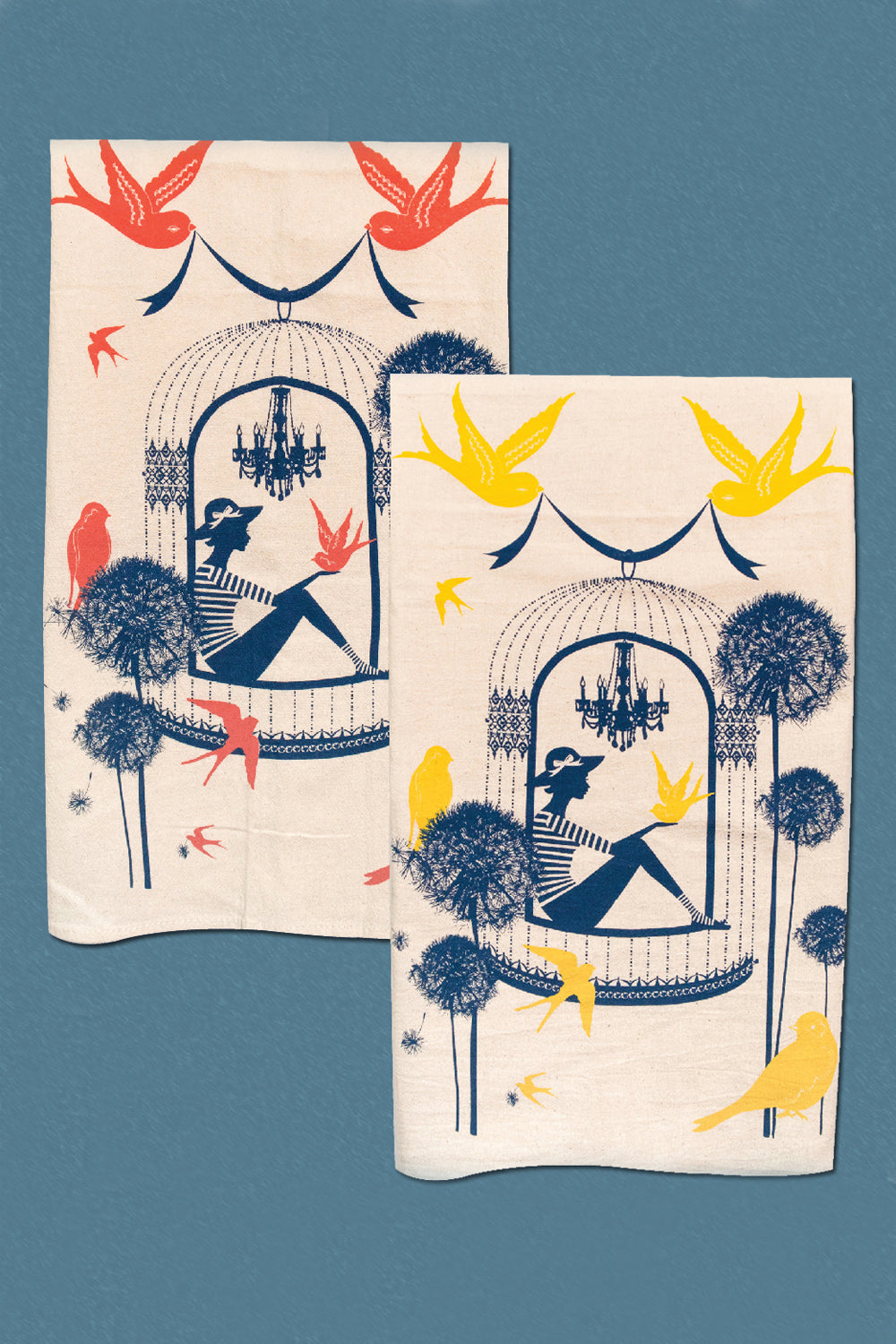 2 cotton tea towels with a woman in a birdcage surrounded by birds and flowers