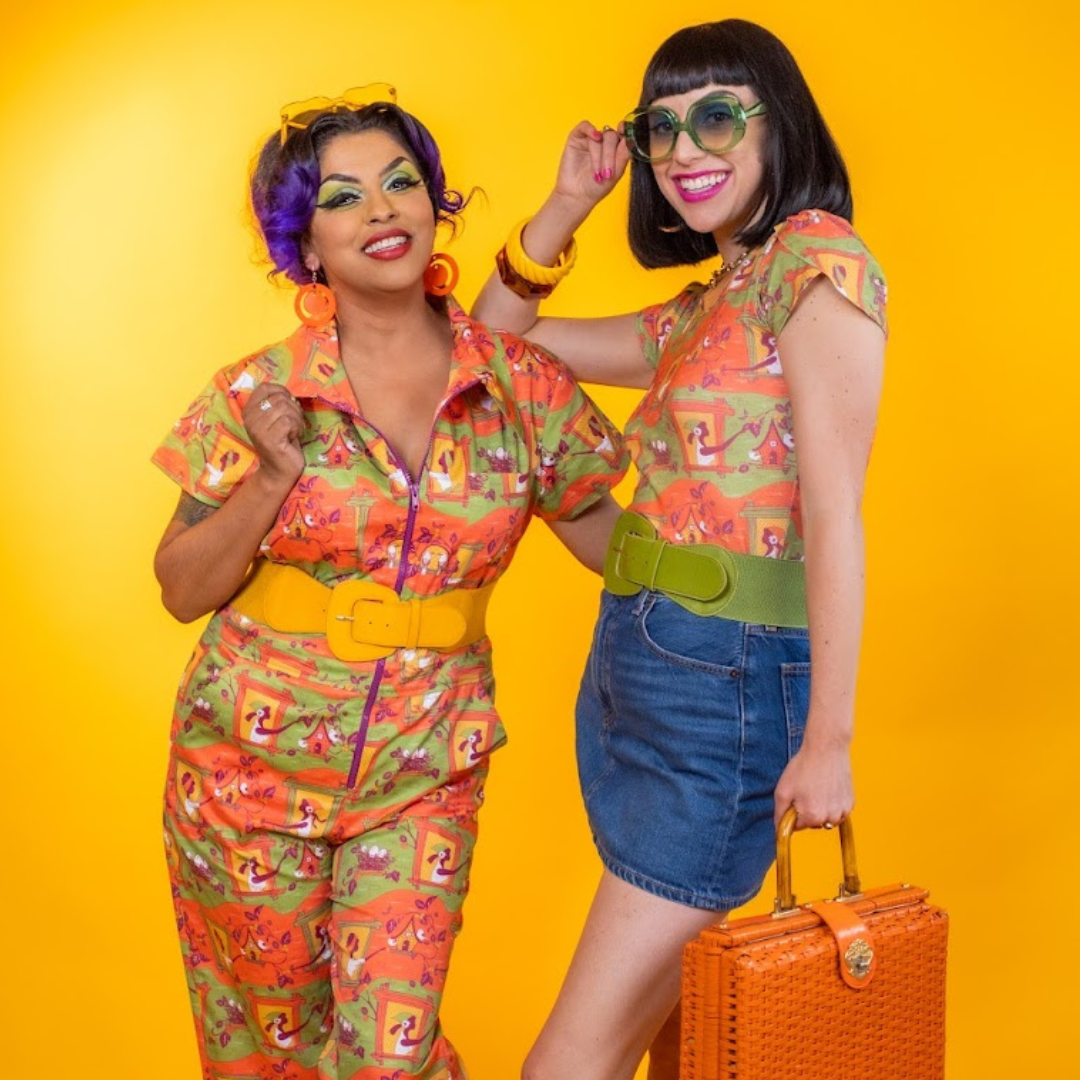 2 models wearing orange and green printed clothing and cute accessories