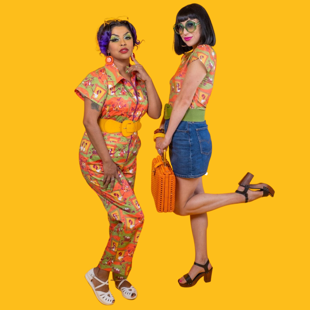 2 models posing in orange and green vintage inspired outfits