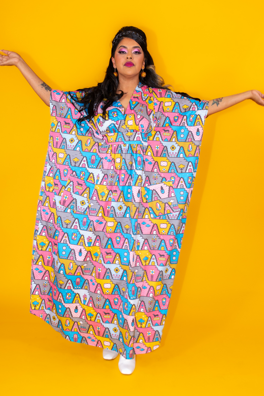 Pretty Latina model in pastel geometric print maxi caftan