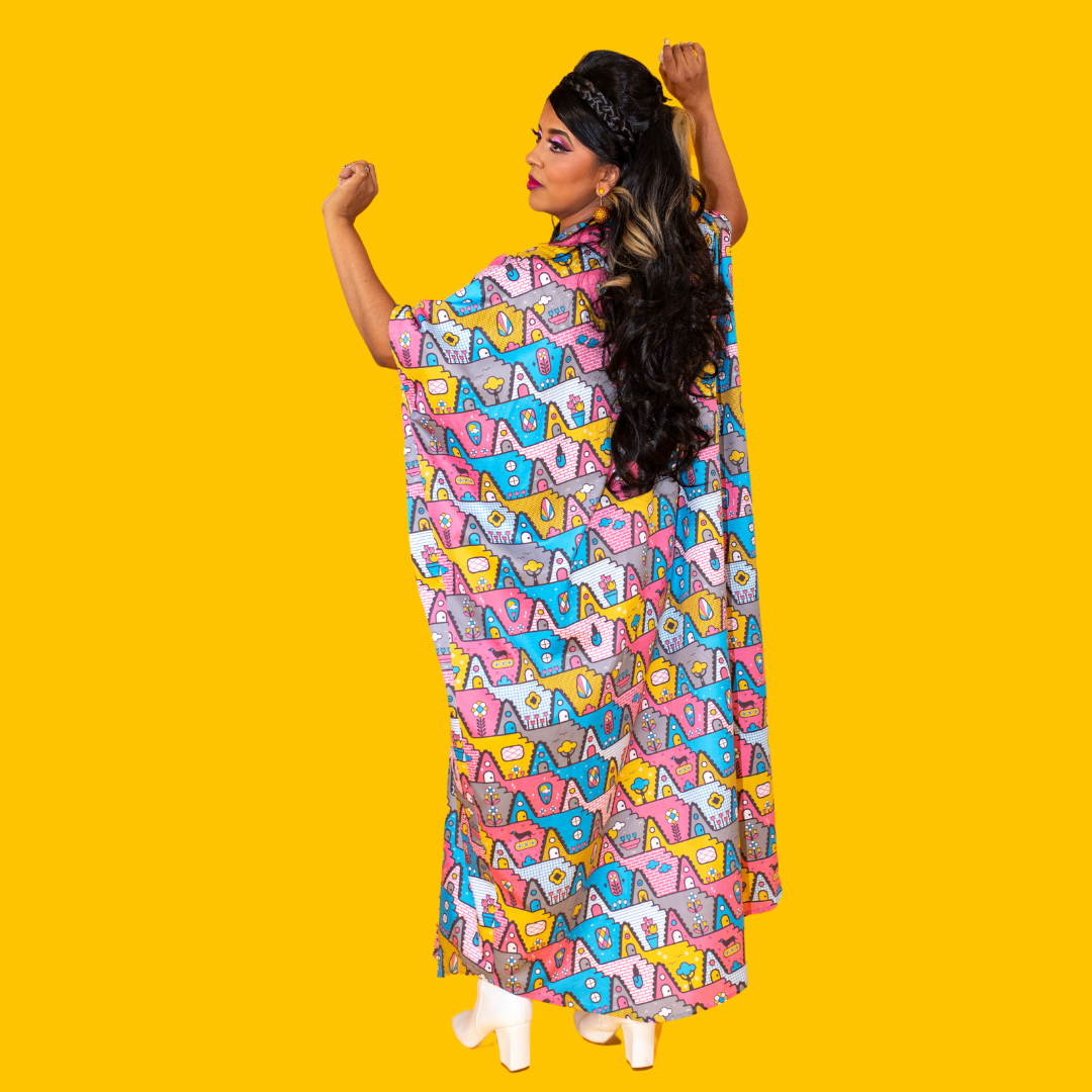 Back view of model in pastel geometric print maxi caftan