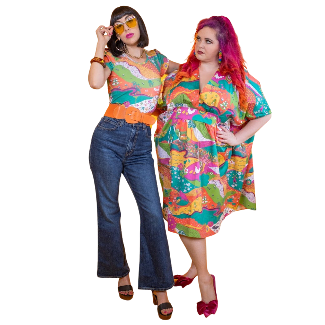2 gorgeous models wearing bright-colored landscape print clothing