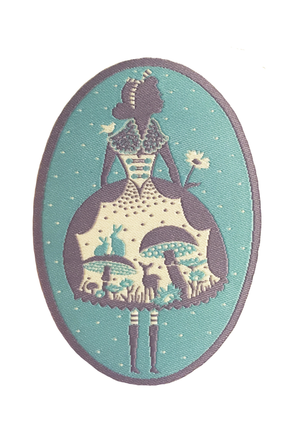 Light blue, grey and white oval patch with Alice in Wonderland design