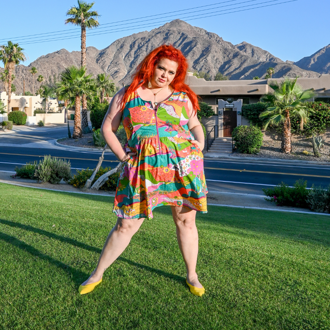 Red-haired model in bold, fun sleeveless cotton sundress