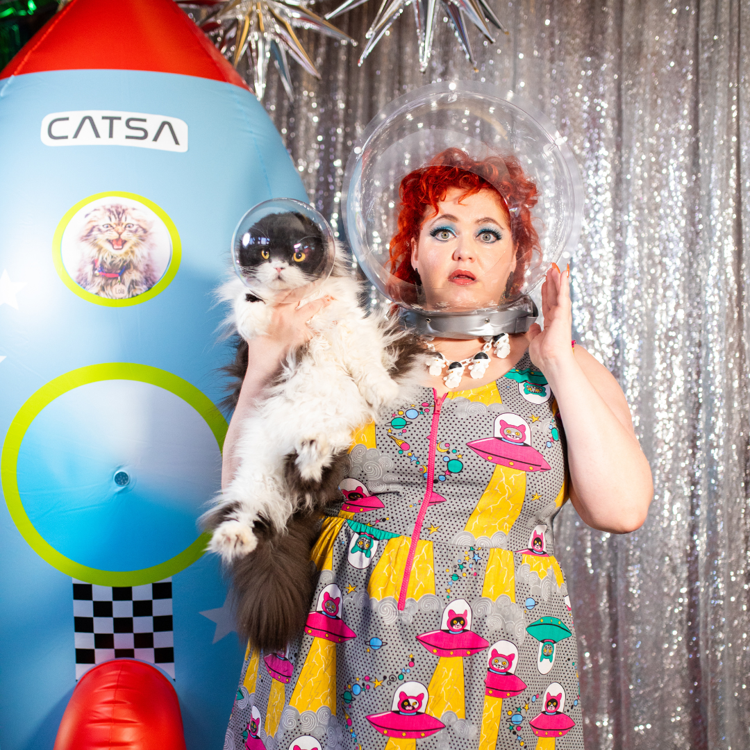 Cat in space helmet with model in space helmet and space cat print grey dress