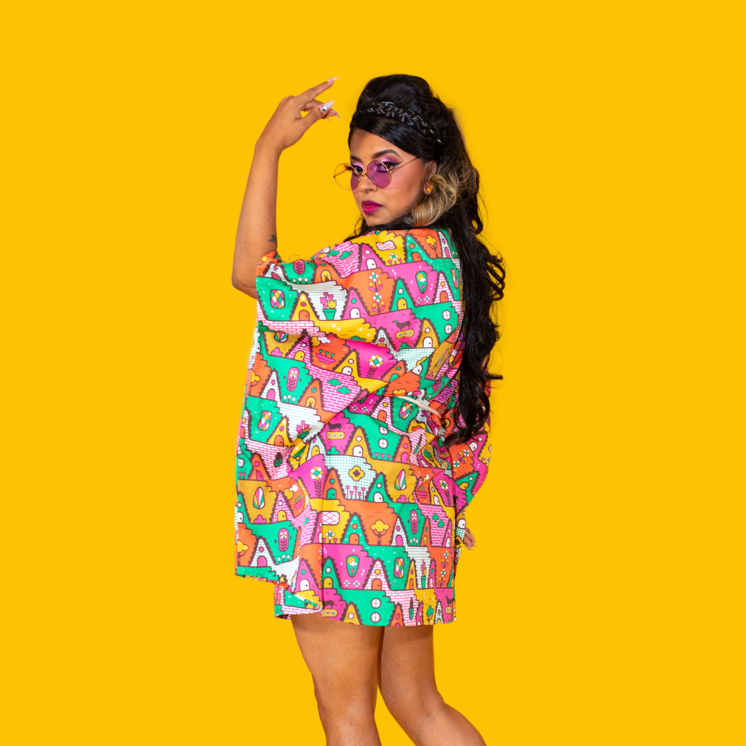 Back view of mini muumuu with rope tie on dark-haired model