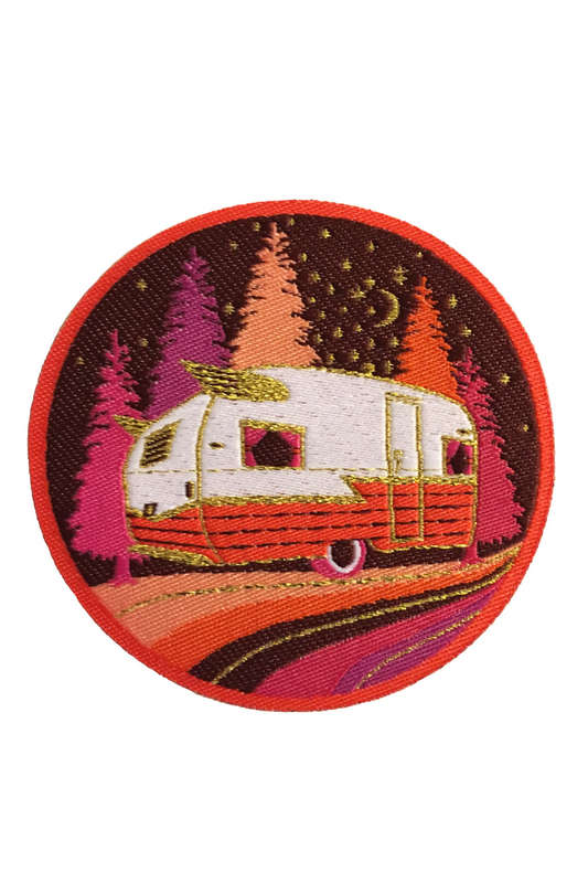Bright red, orange, pink and gold woven patch with vintage camper