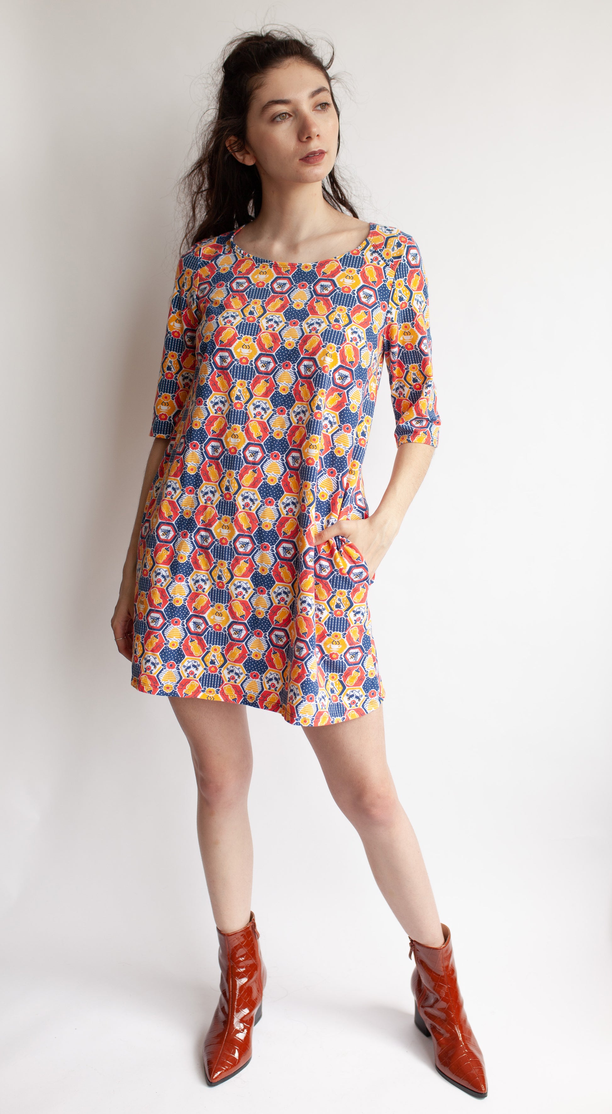 Red yellow and blue geometric honeycomb, bee, honey and flower print pocket tunic 