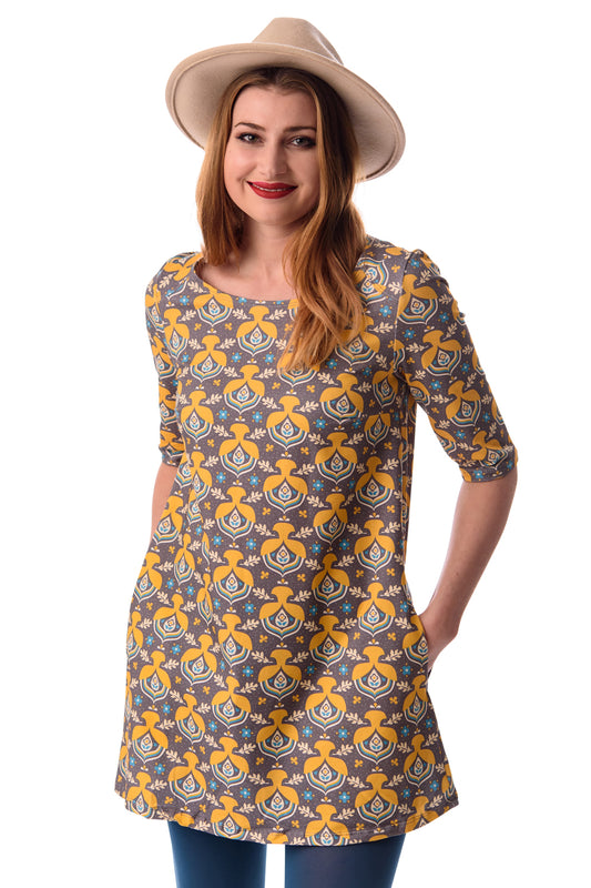 Womens a-line pocket tunic with blue, yellow and white acorn and flower print