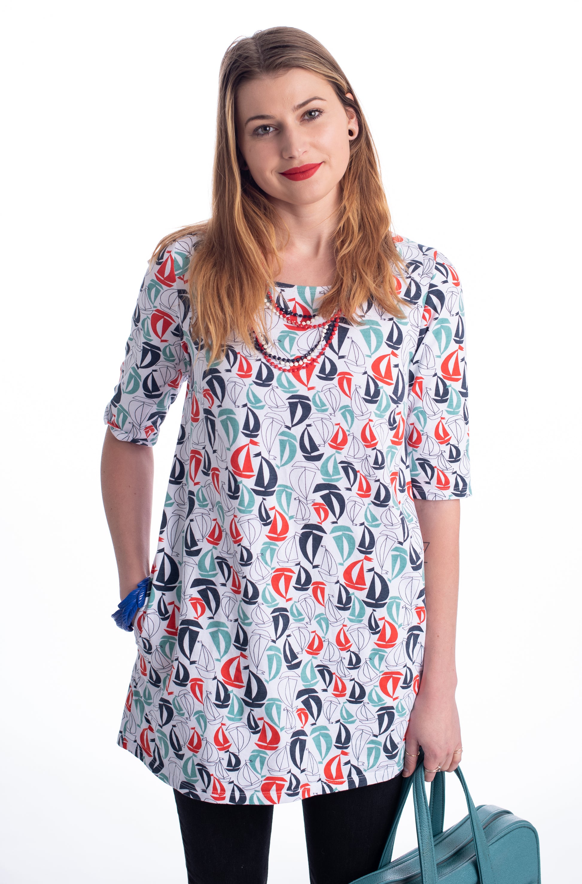 Model in red, white and blue sailboat print pocket tunic