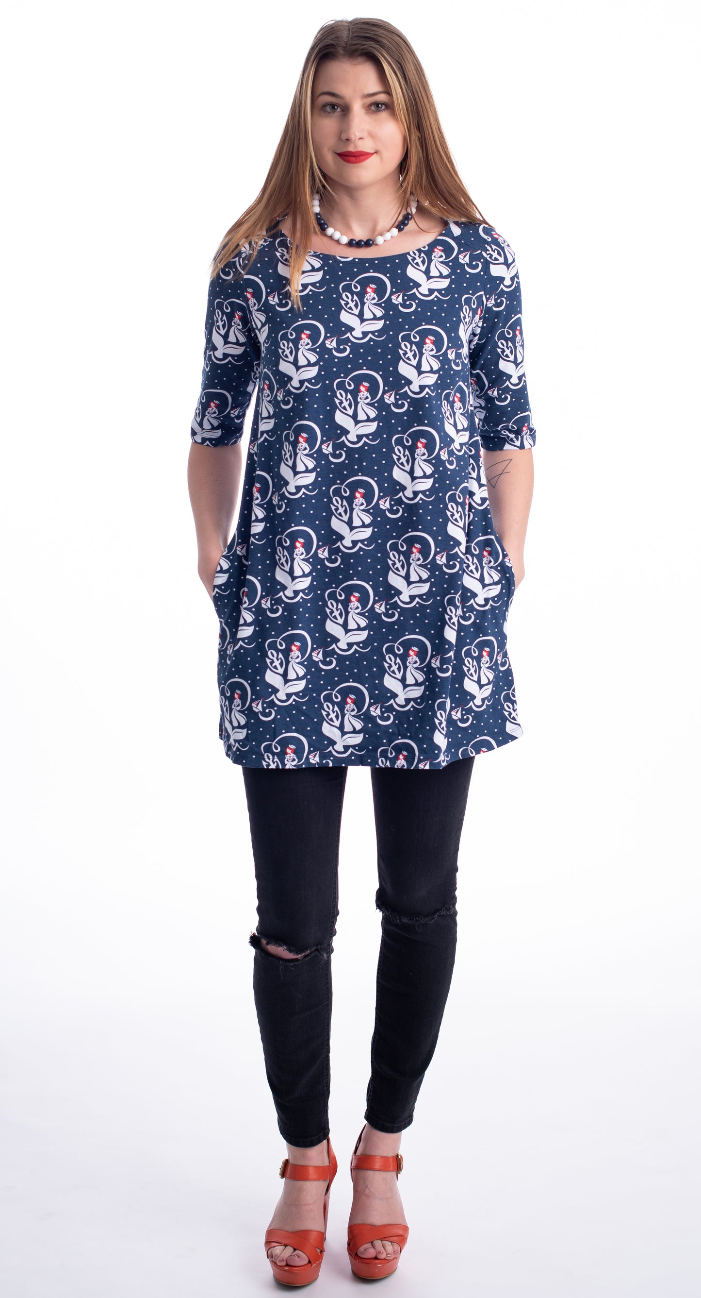 Tall model in navy, red and white sailor girl, anchor and whale tail print nautical pocket tunic