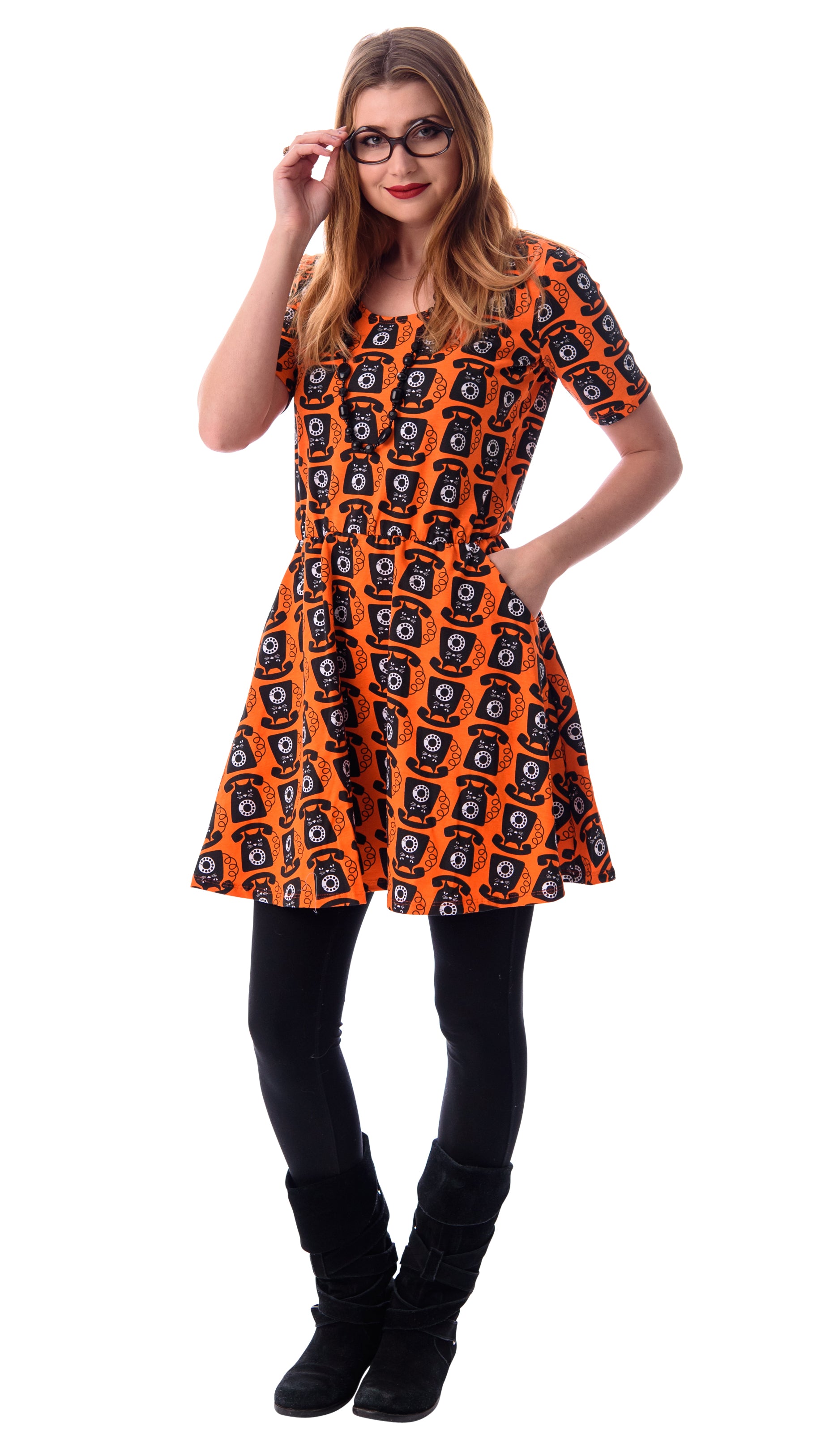 Orange black and white cat phone print knit skater dress with elbow length sleeves, pockets and elastic waist
