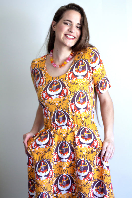 A Well-Protected Lass Skater Dress in Goldenrod