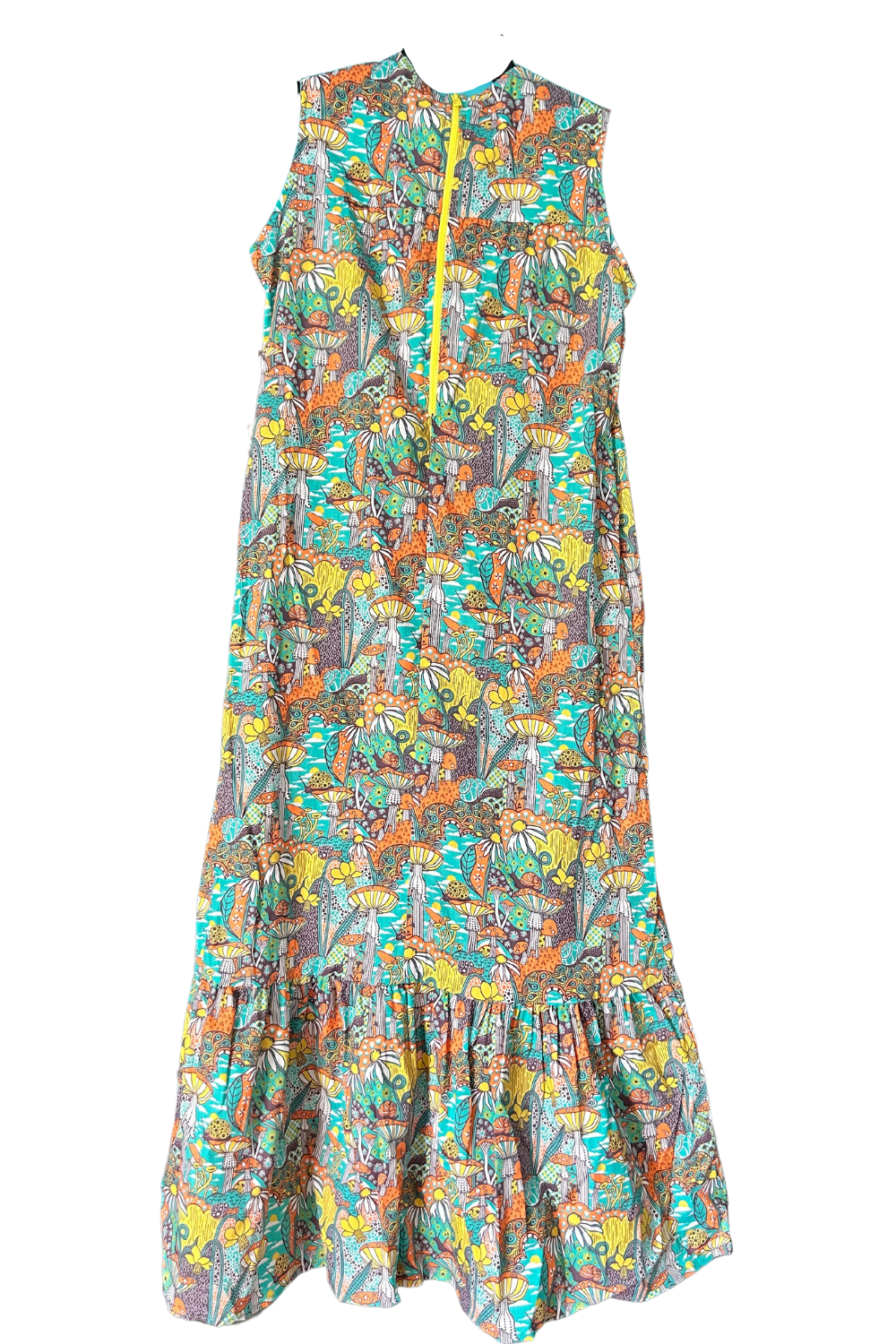 Back view of teal, orange, and yellow mushroom and flower print maxi dress with bottom ruffle