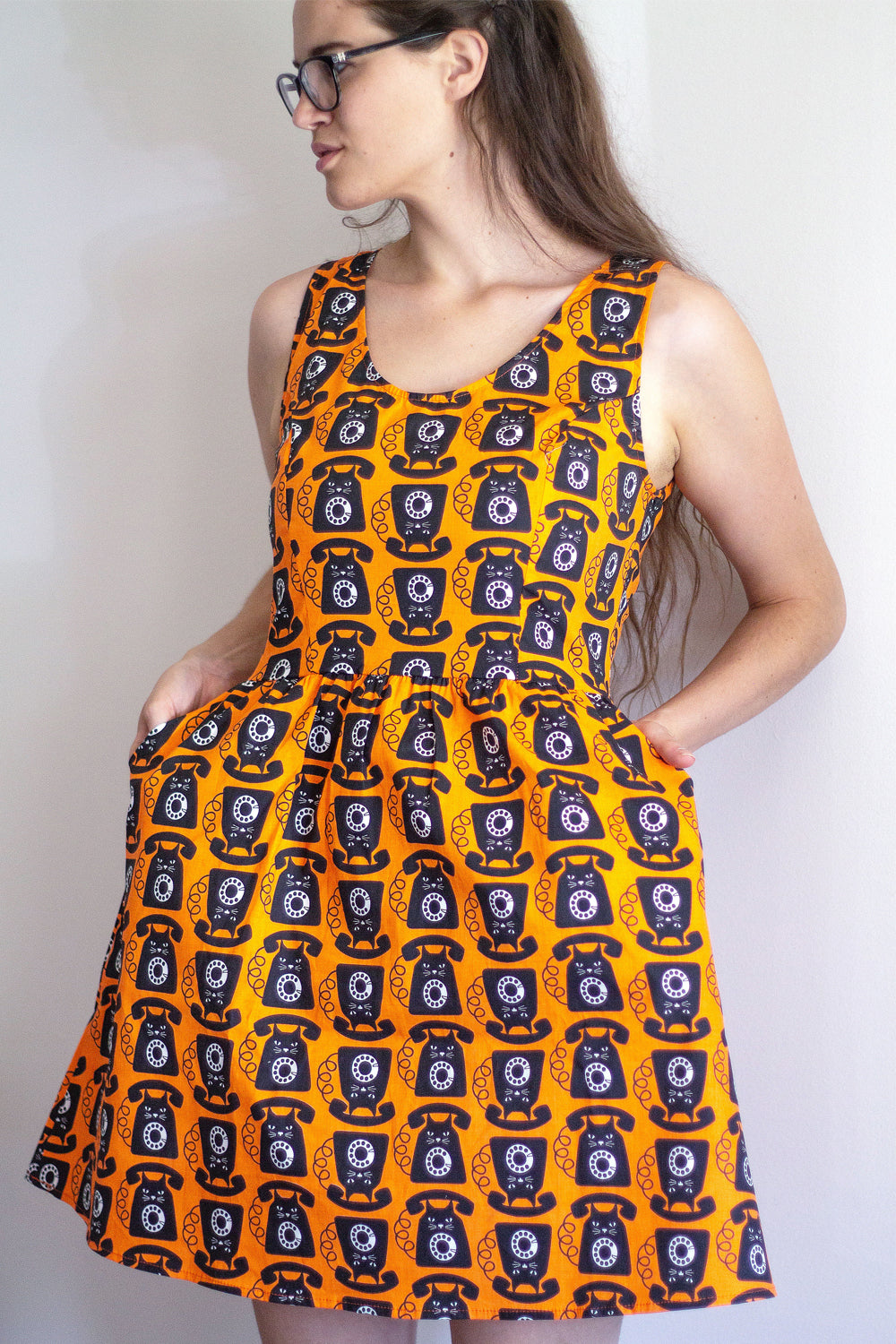 Bright orange black white cat phone print fit and flare above knee dress with pockets
