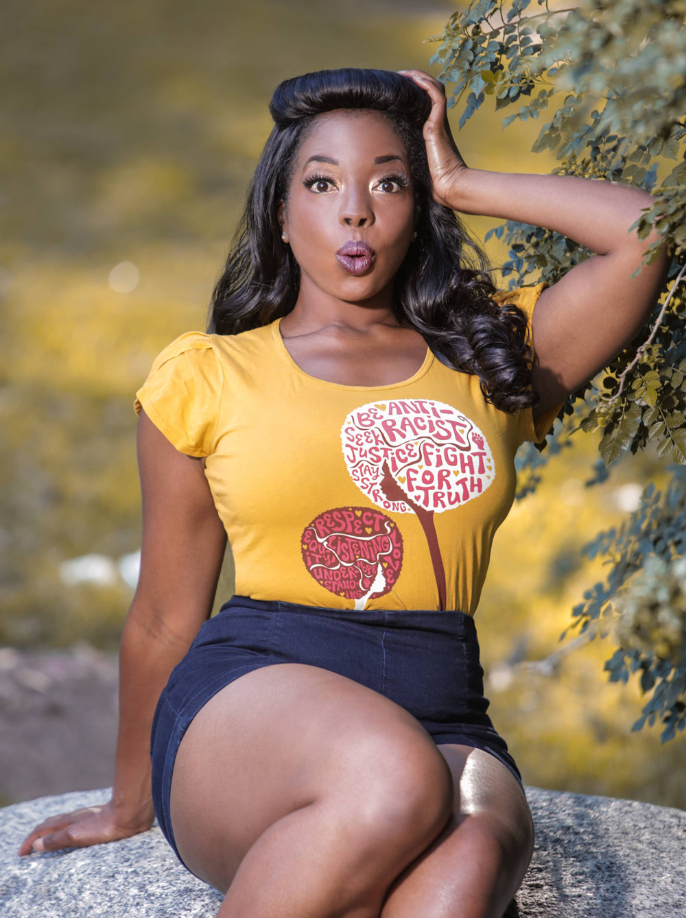 Yellow tee with anti-racist messages on gorgeous Black model