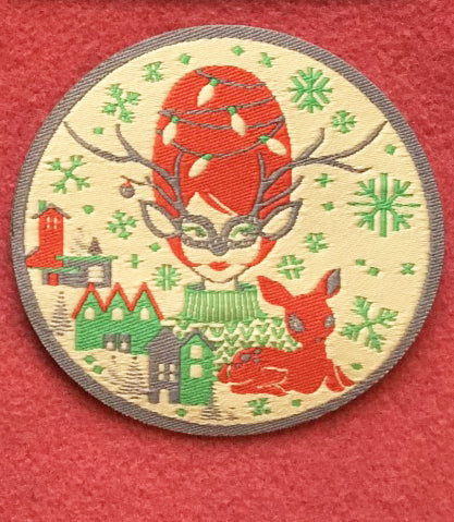 Red and green iron on Christmas patch  with putz houses and reindeer