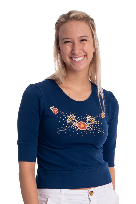 Navy blue scoop neck cropped French terry top with print of bees and flowers on blonde model