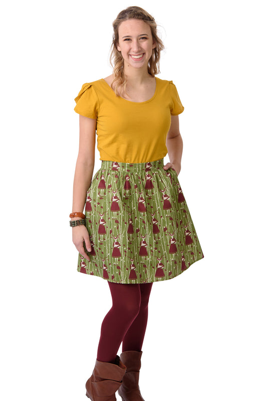 Gathered olive green and brown skirt with deer, birches and masked girl print and pockets