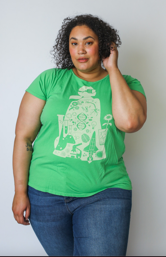 Bright green crewneck tee with white graphic of scientist, DNA, and rocket on model