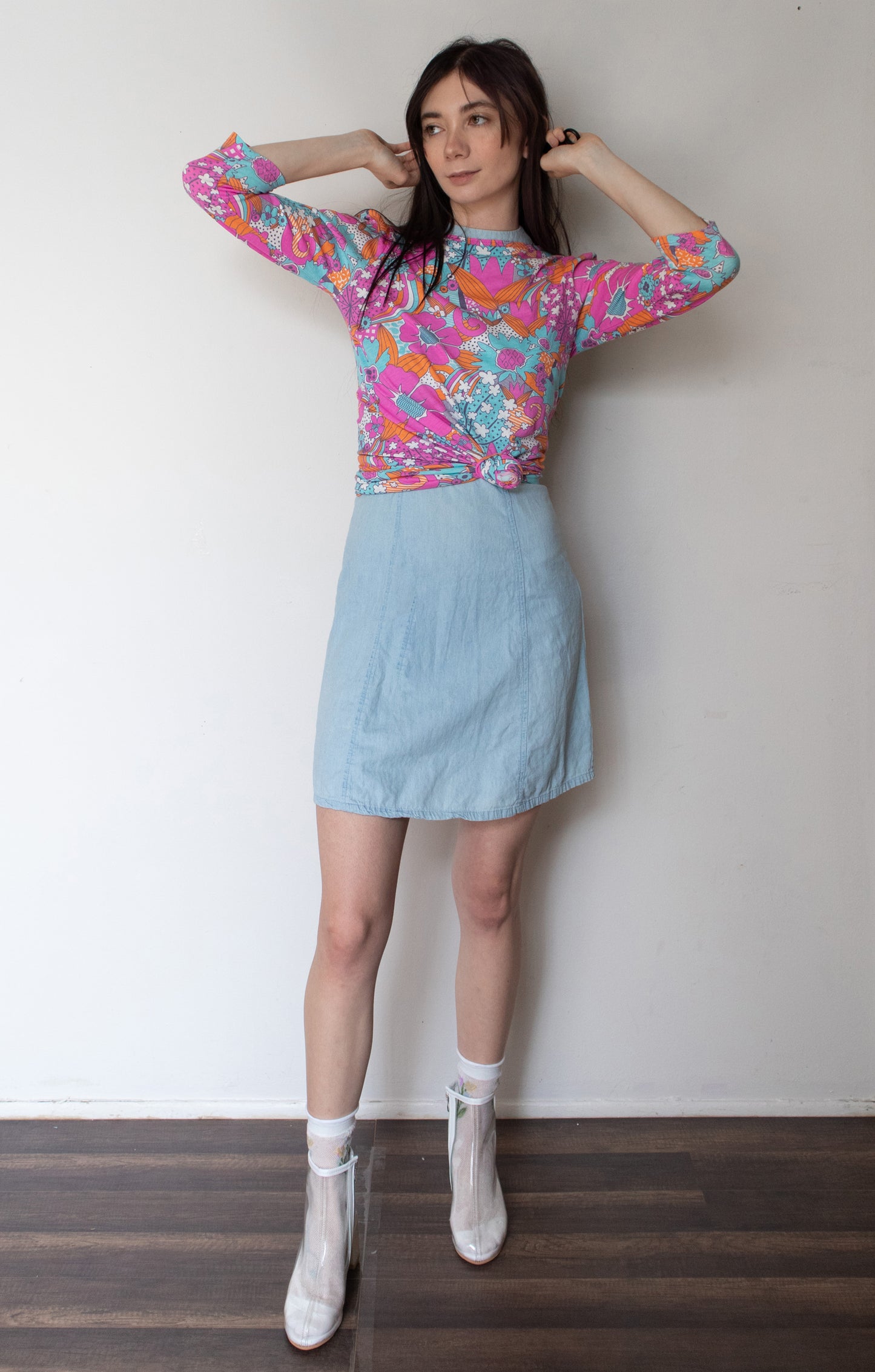 Bright pink, aqua and pink floral 3/4 sleeve cotton tee with skirt on model