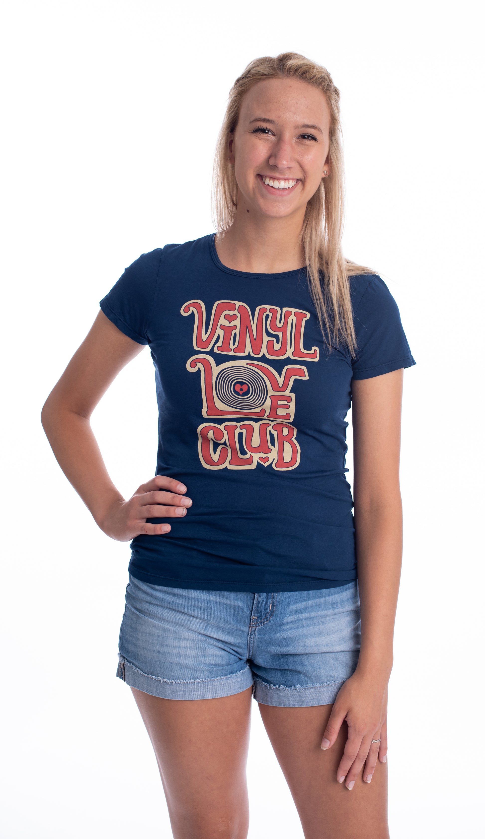 Navy blue graphic tee with "Vinyl Love Club" text in red and off white on blonde model in jean shorts