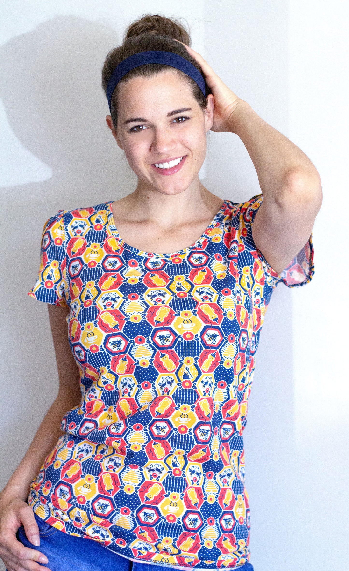 Red, yellow and blue honeycomb, flower and honey bee print tulip-sleeved tee