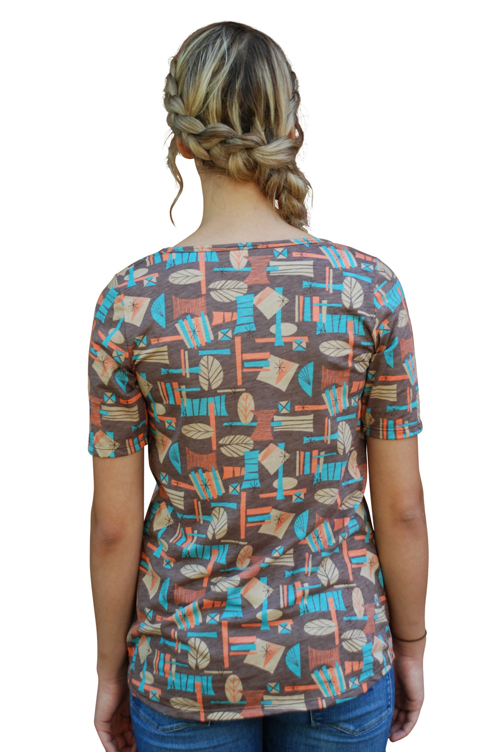 Back view of brown peach and aqua v-neck cotton tee on model with braided hair
