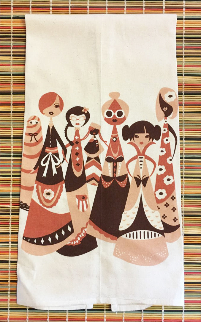 A dish towel featuring a variety of women