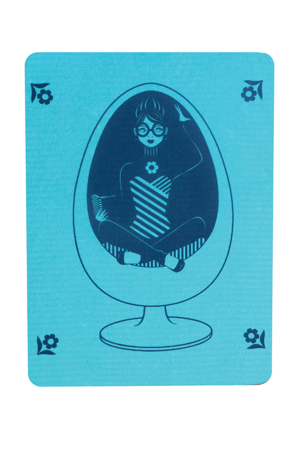 Blue Swedish dishcloth with grey graphic of a girl reading a book in an egg chair