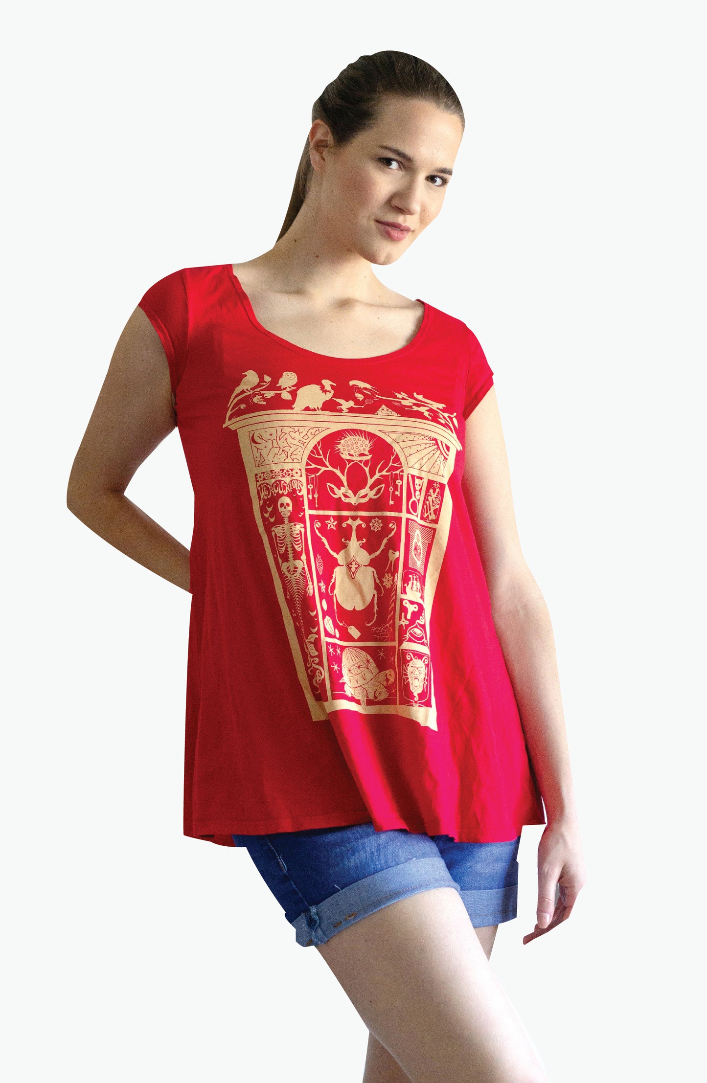 Red scoop neck cap-sleeved trapeze top with white cabinet of curiosities print on model 