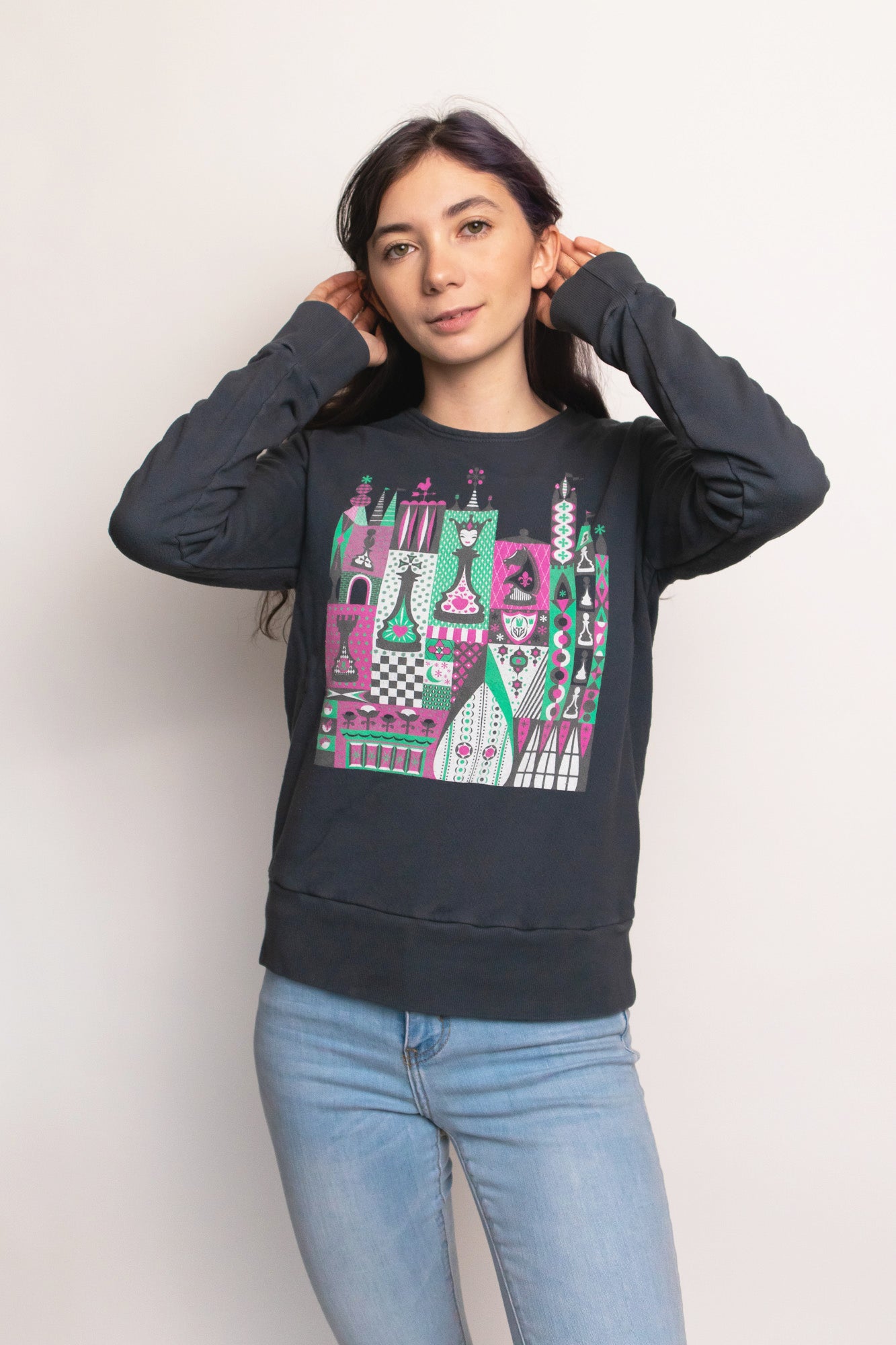 Grey chess print pullover sweatshirt on young woman