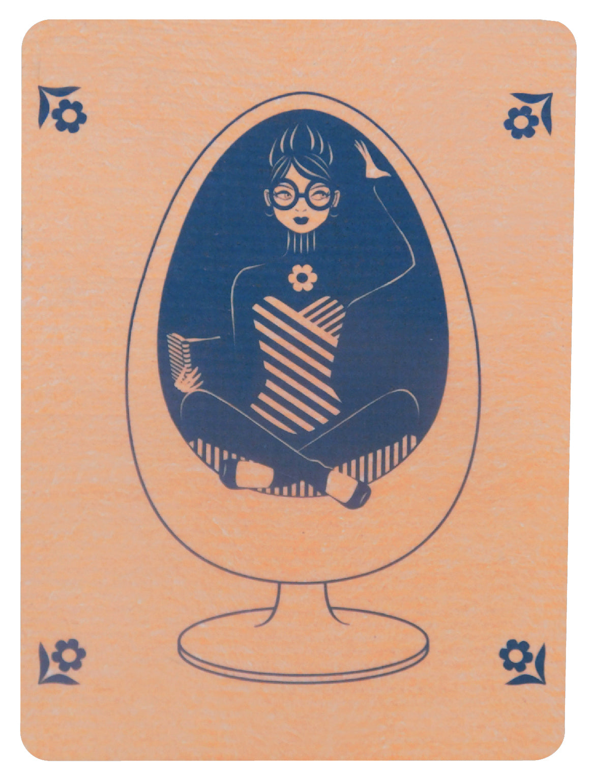 Orange Swedish dishcloth with grey graphic of a girl reading a book in an egg chair