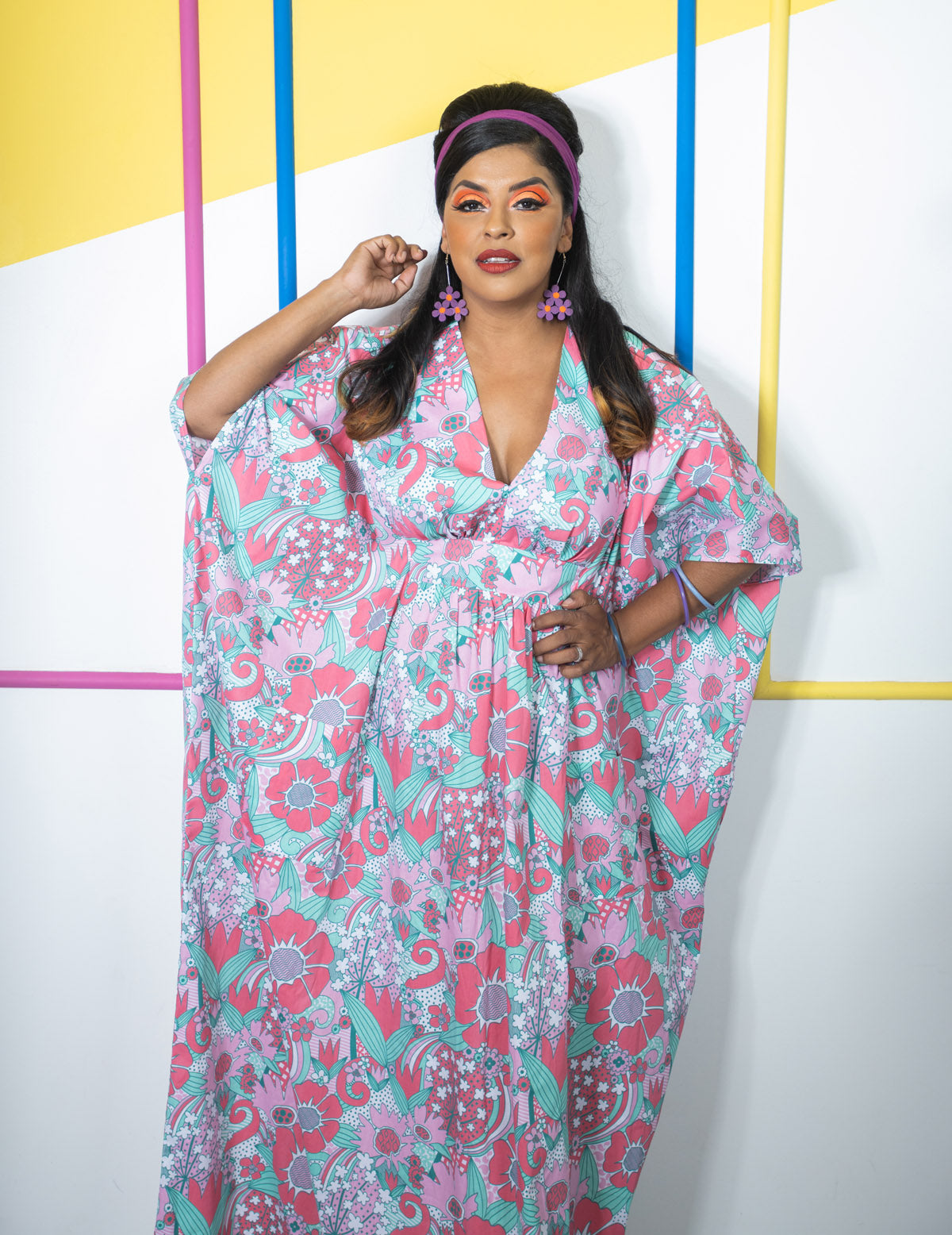 Pink and mint green floral maxi caftan on model 