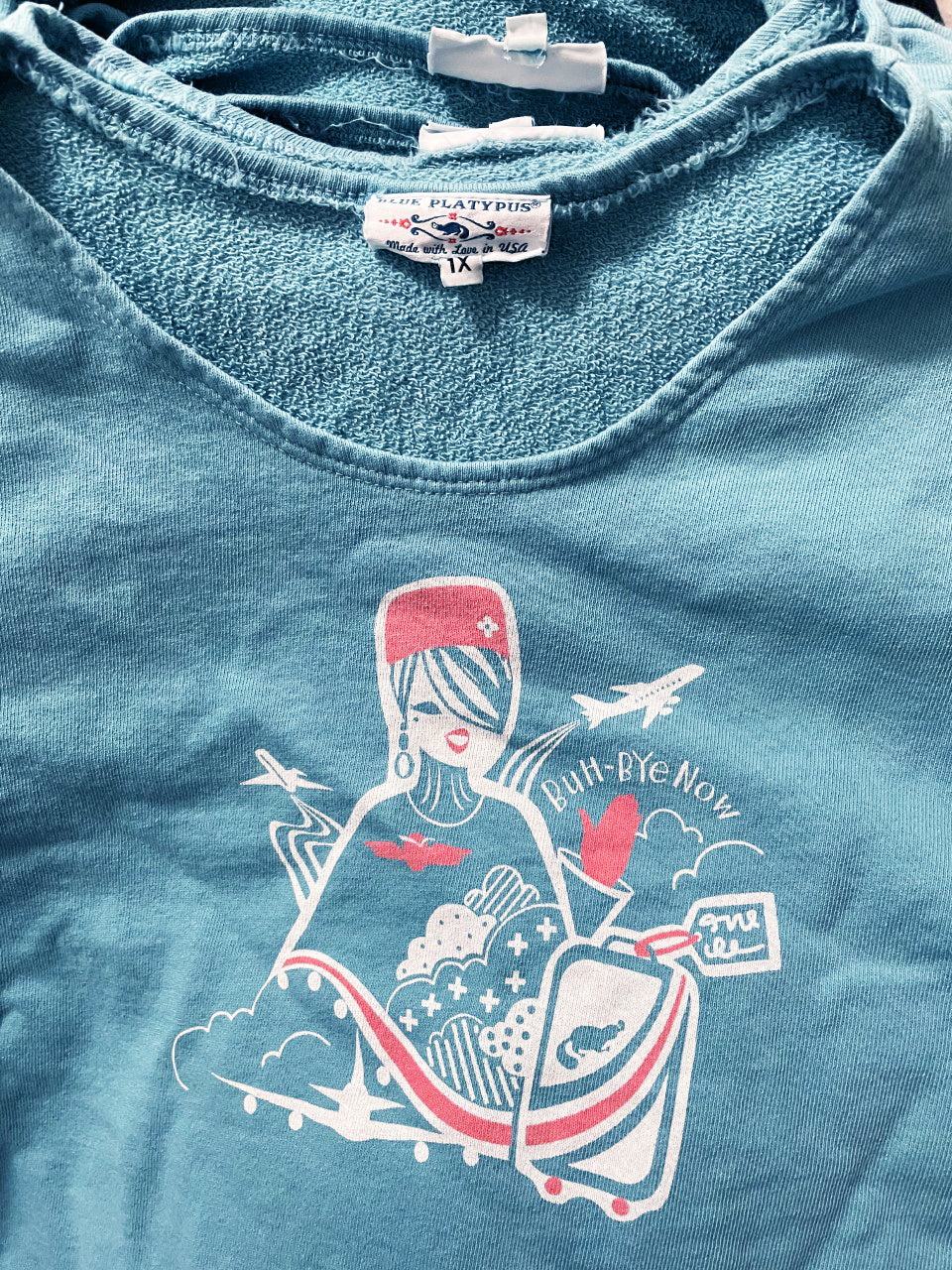 Aqua sweatshirt with stewardess print and text reading "Buh-bye now"